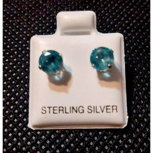 Sterling silver brand new blue topaz sterling silver studs
